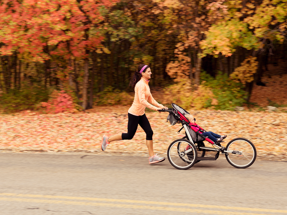 Person running with a jogging stroller
