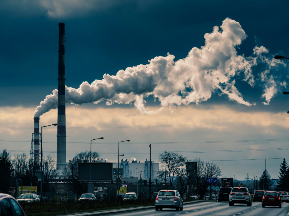 Power plants with smoke coming out of their smokestacks