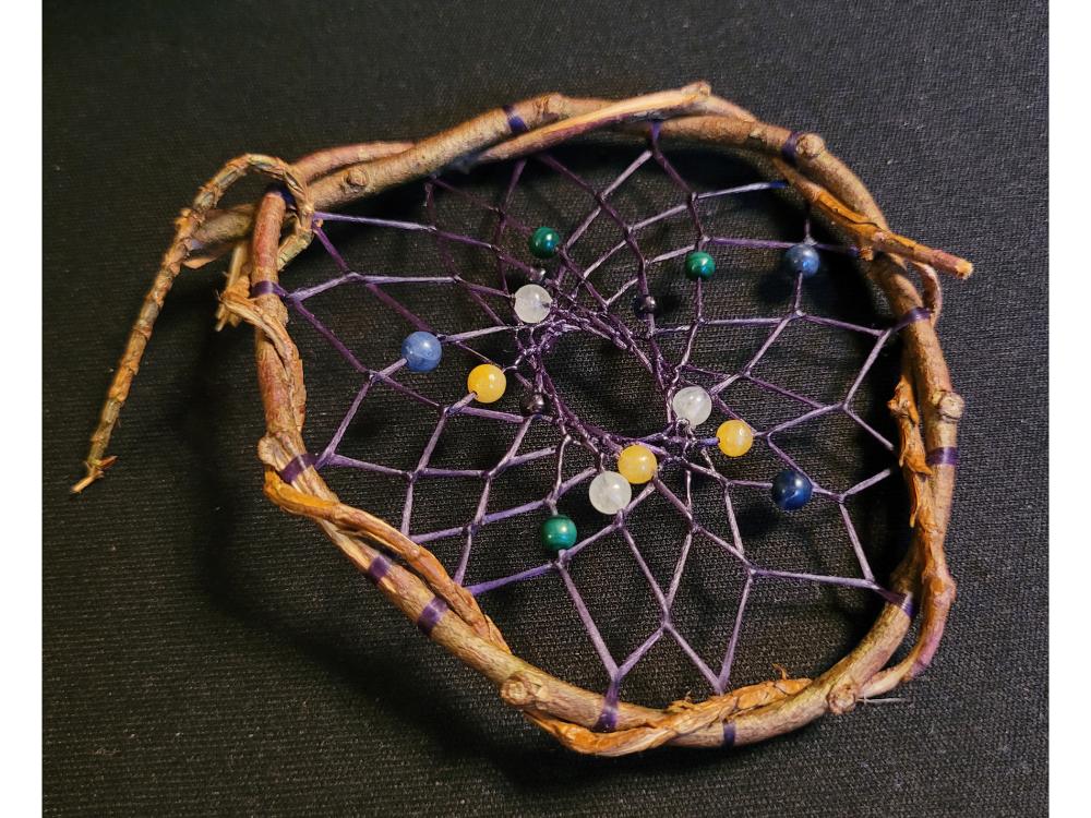 A pretty handmade dreamcatcher with gemstone beads