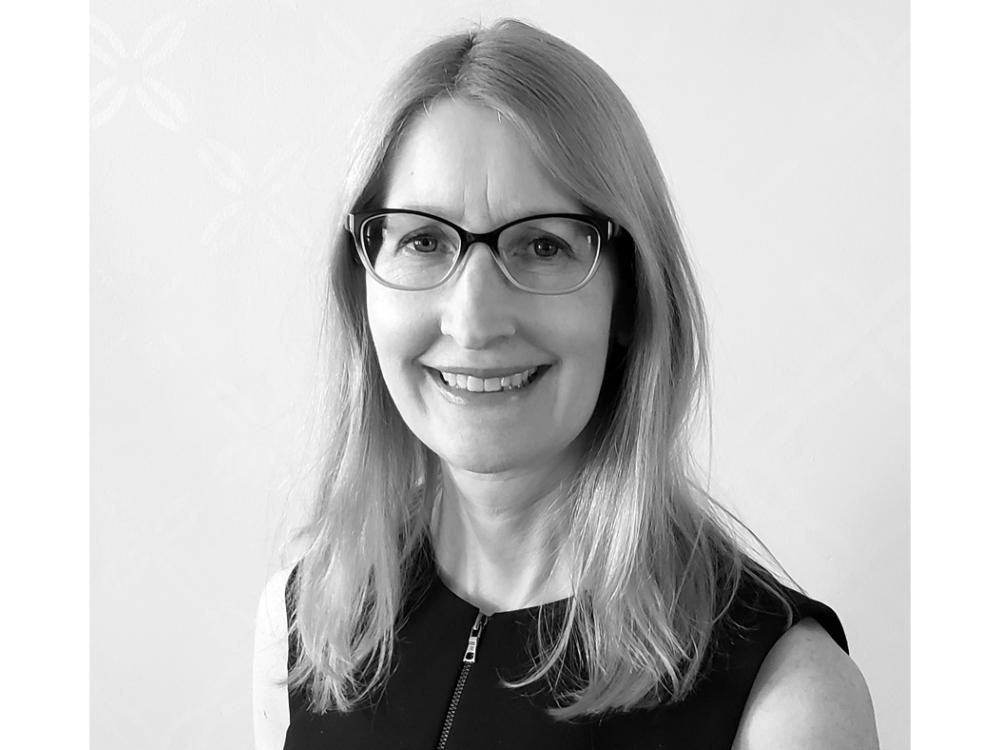 Black and white portrait of Karen M'Closkey.