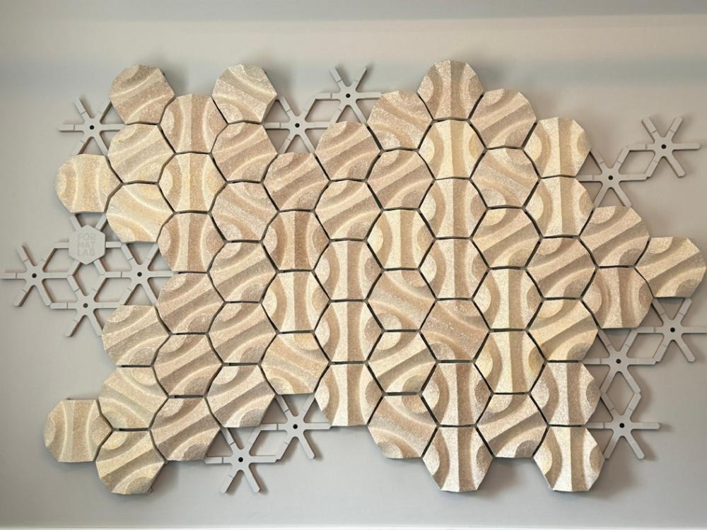 The acoustic wall installed on a wall in the provost's office.