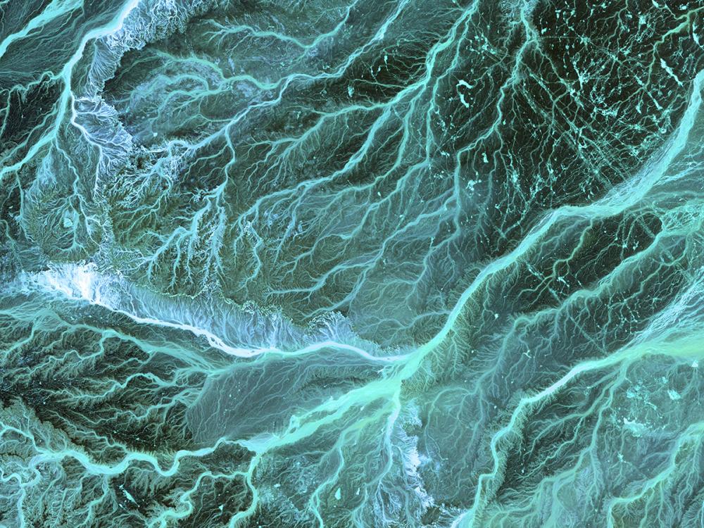 Aerial view of meandering streams through southeastern Jordan