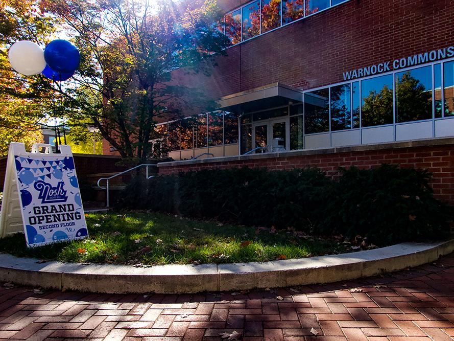 Sandwich board announcing the grand opening of Nosh Kosher Deli at North Dining Commons