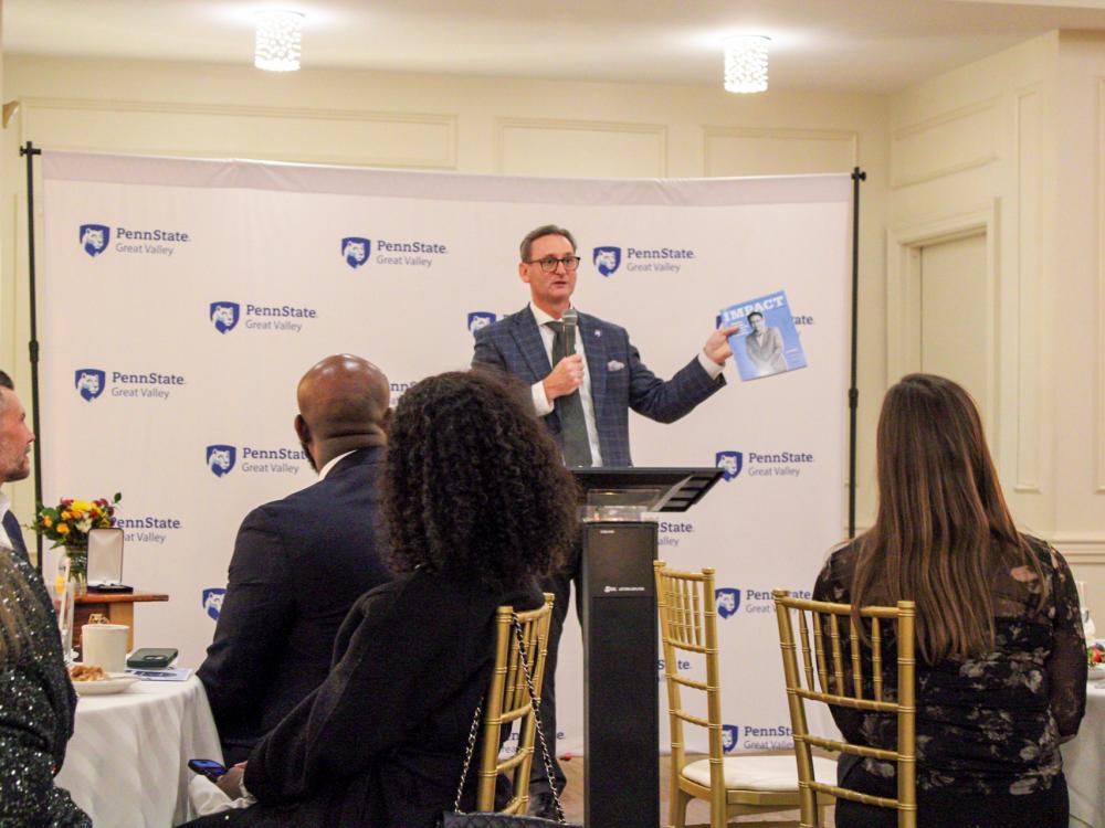 The Penn State Great Valley chancellor speaks to a group of donors and alumni at a dinner.