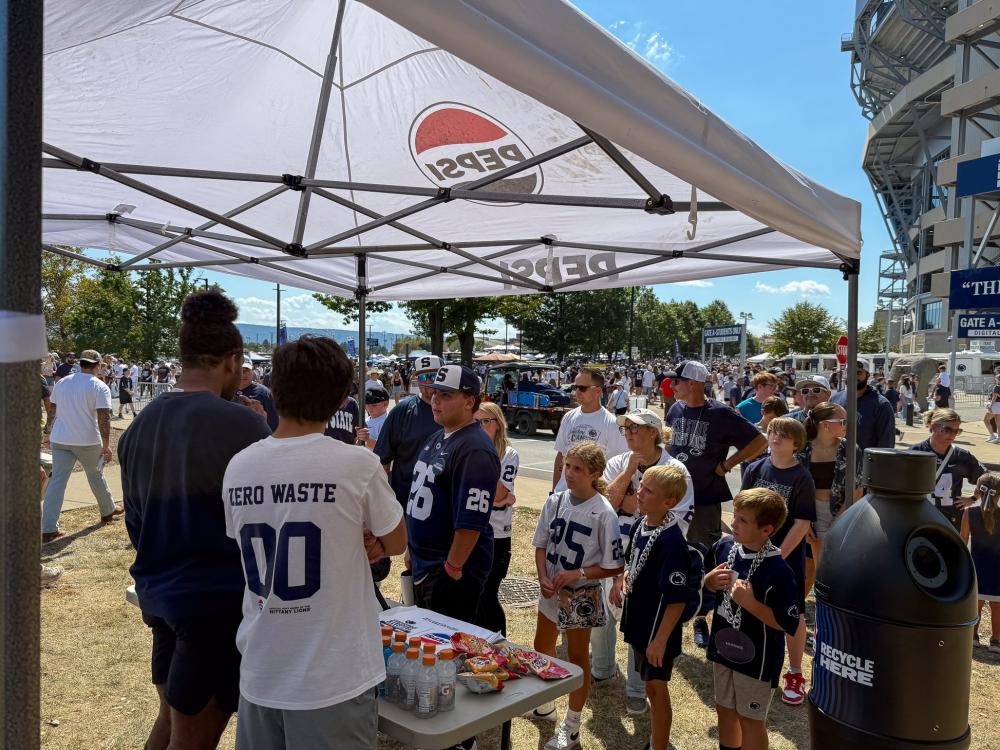 Tailgate Ambassadors host a table before a Penn State football game