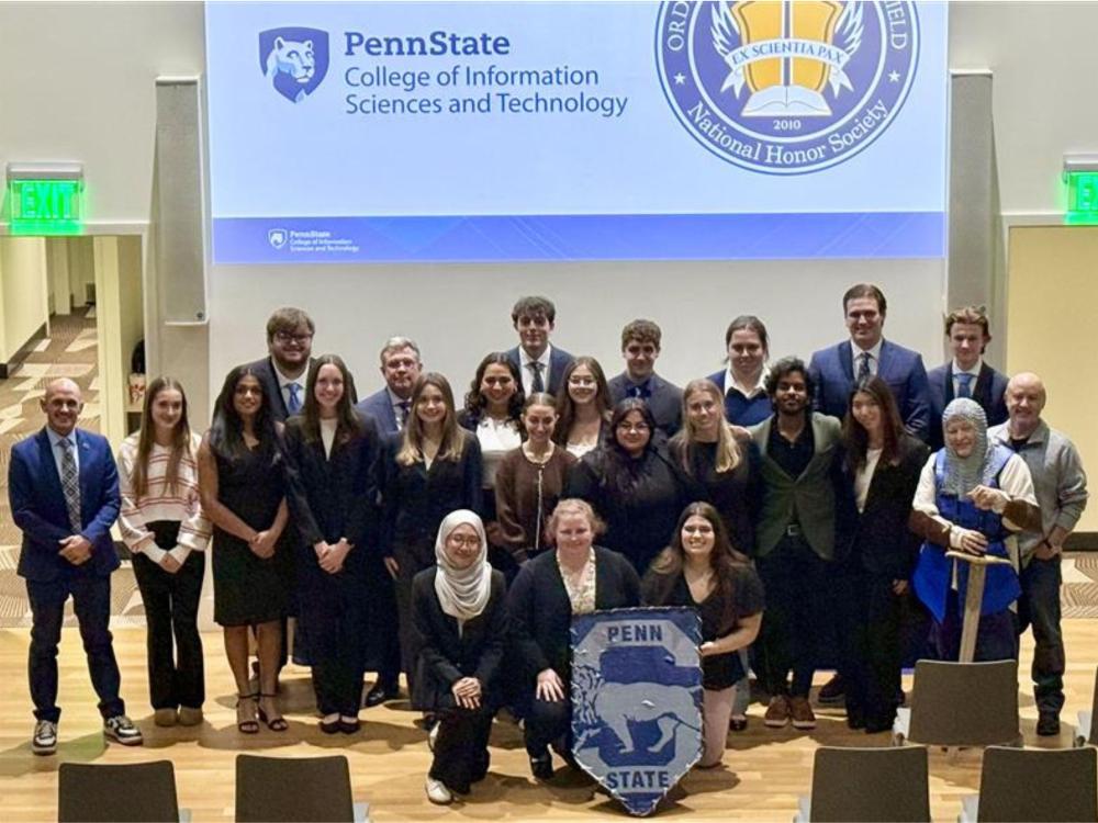 group of college students at honor society ceremony