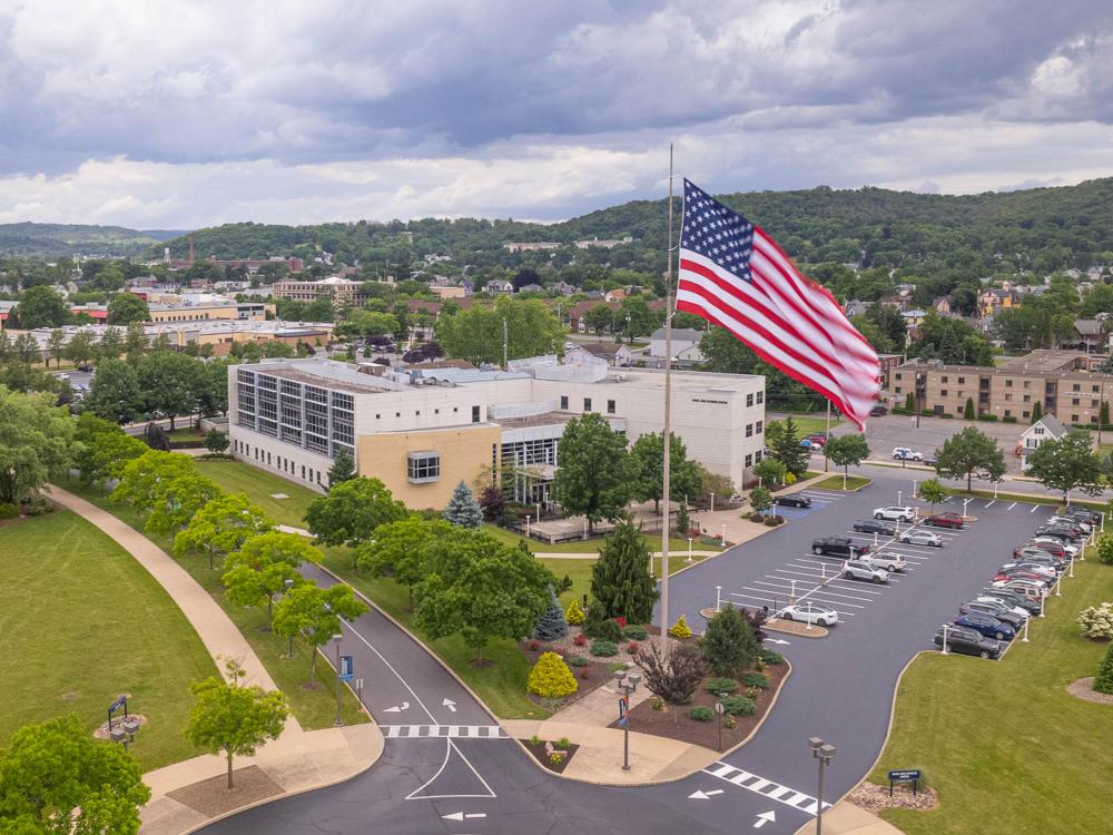 Penn College campus aerial view with US flag