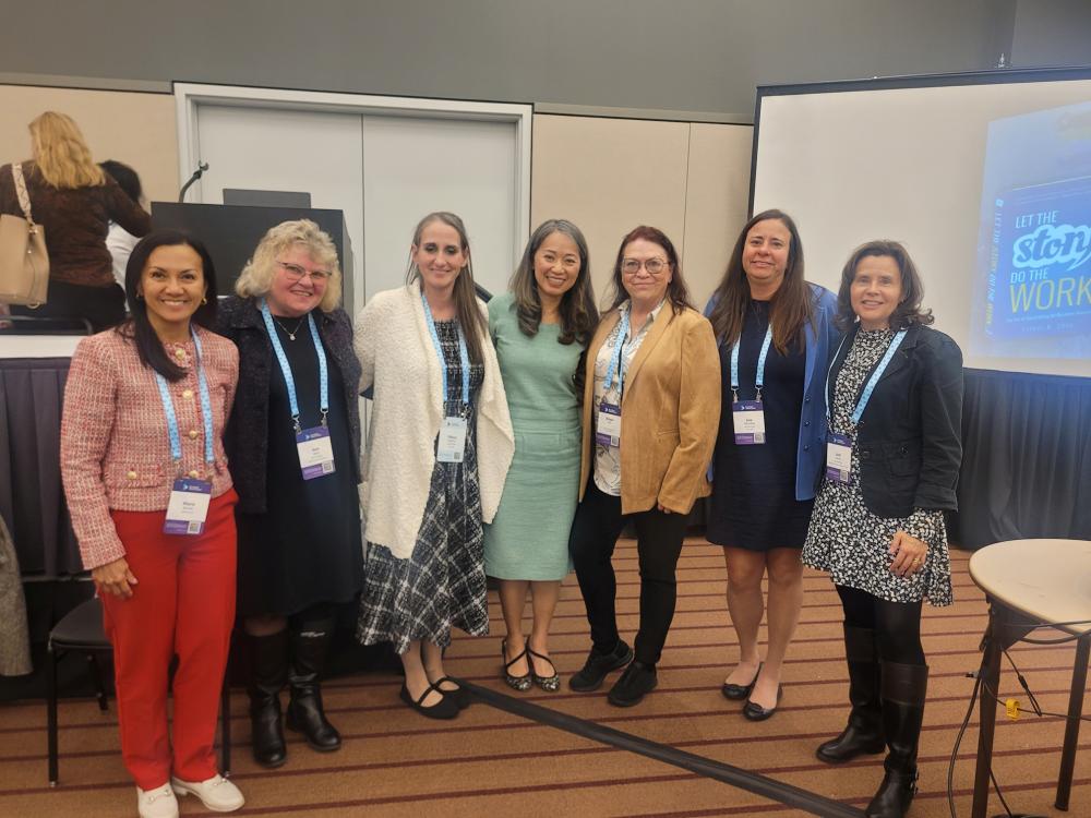Joie Marhefka, associate teaching professor of biomedical engineering technology at Penn State, stands with fellow panelists and collaborators at the Global Impact Forum in Pittsburgh, where she presented research on AI workforce readiness as part of the RAISE-PA initiative.