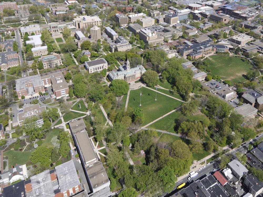 Aerial view of the Penn State University Park campus with Old Main most prominently shown
