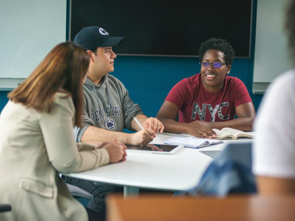 Group of students working at table