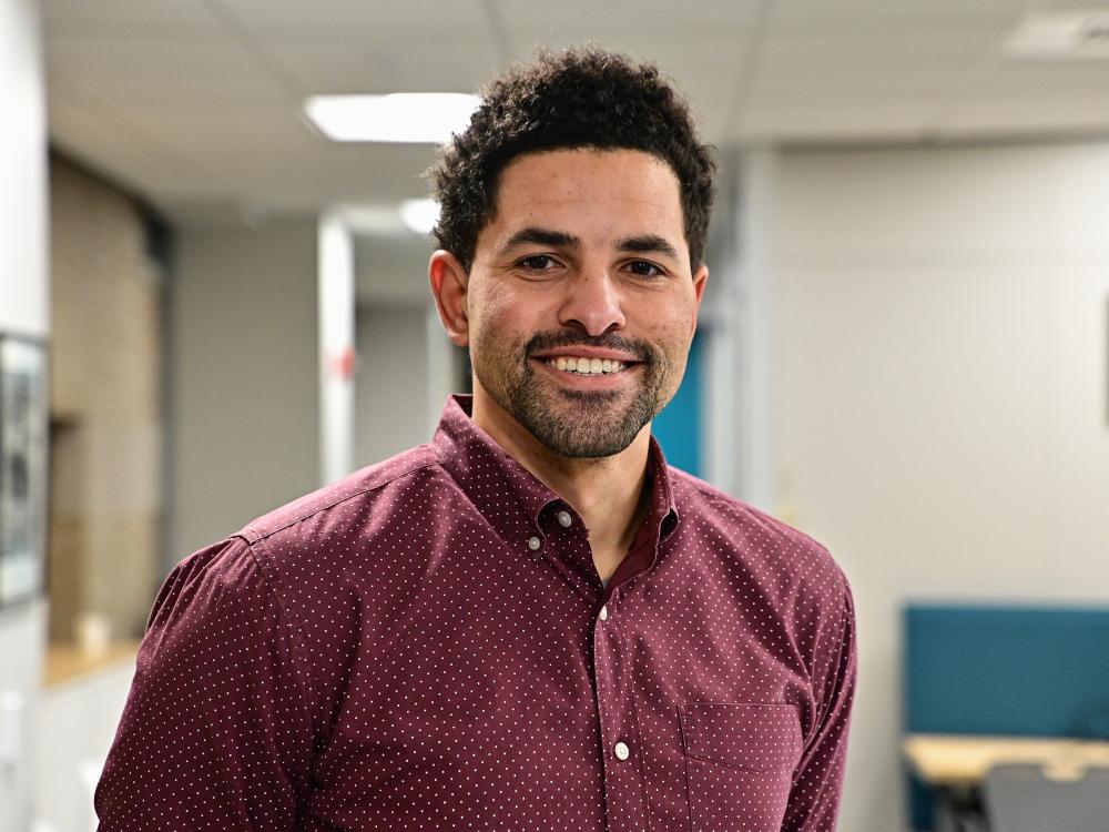 Christopher Dancy, associate professor of industrial and manufacturing engineering and of computer science, poses for a headshot.