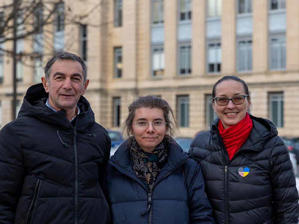 From left, Oleksandr Gon, Mariia Grytsenko and Yuliya Ladygina gather outside on Penn State's campus. 