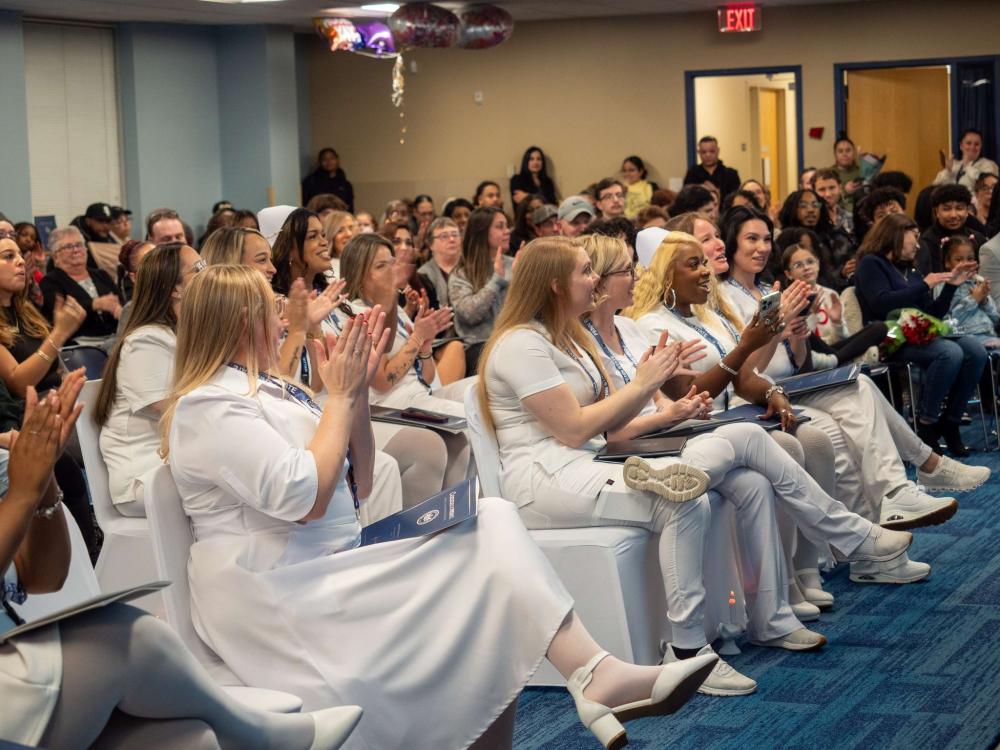 audience sitting and applauding