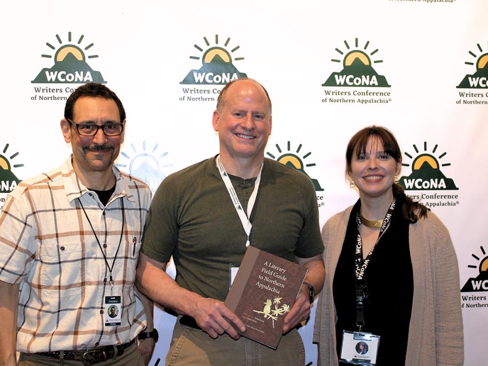 Todd Davis receives the 2026 WCoNA Book of the Year with PJ Piccirillo (WCoNA president, L) and Kimberly McElhatten (director, WCoNA Book of the Year, R)