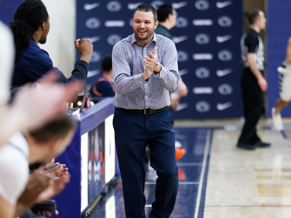 men's basketball coach clapping
