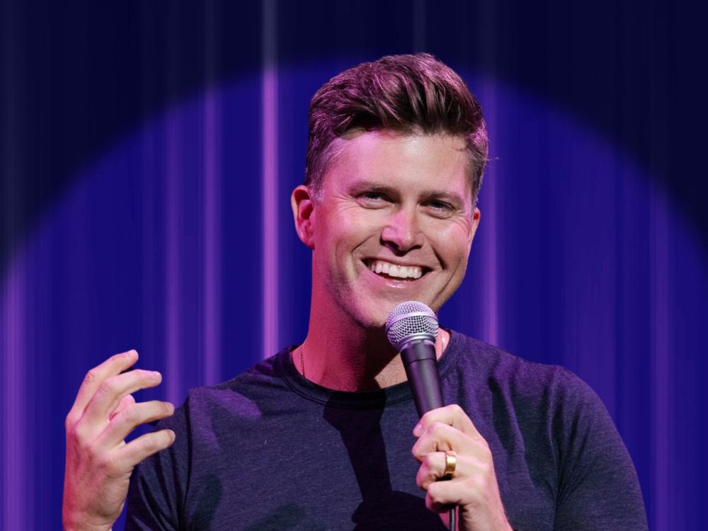 Vertical photo of Colin Jost doing standup