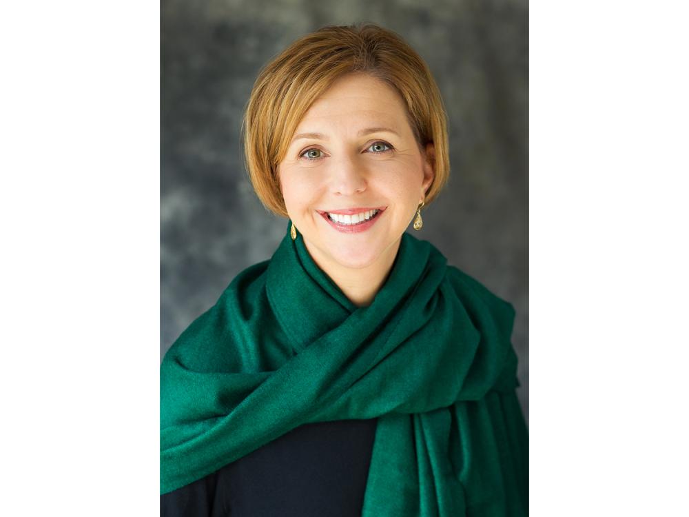 A headshot image of Emily Metzgar