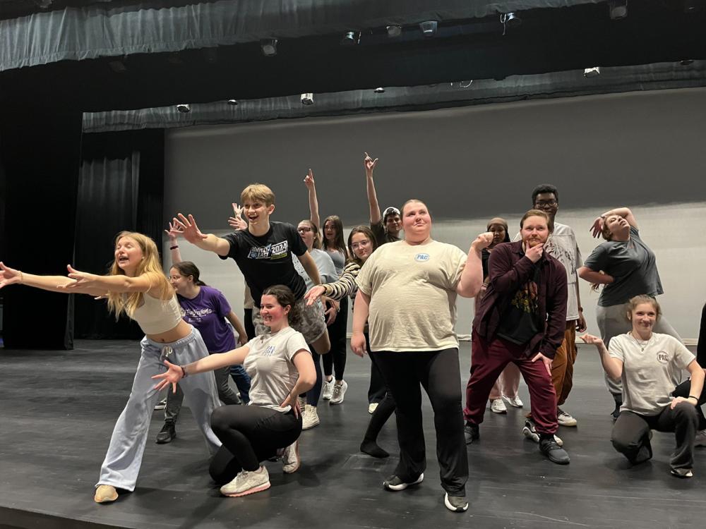 A group of dancers on stage