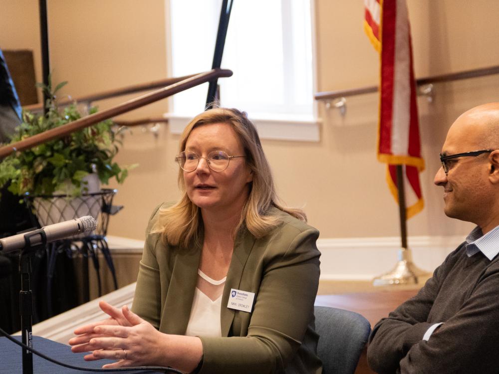 Nikki Crowley and Santhosh Girirajan speaking at the Village during Brain Awareness Week.