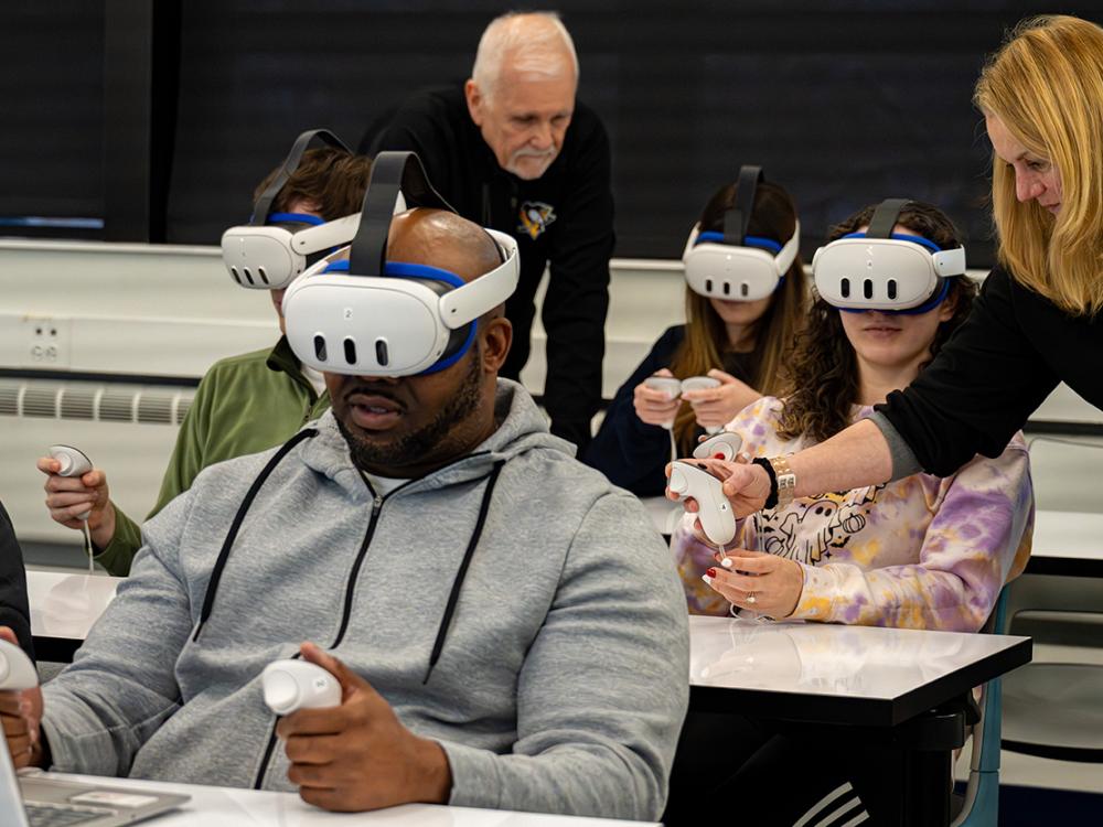 Students wear VR headsets in a classroom