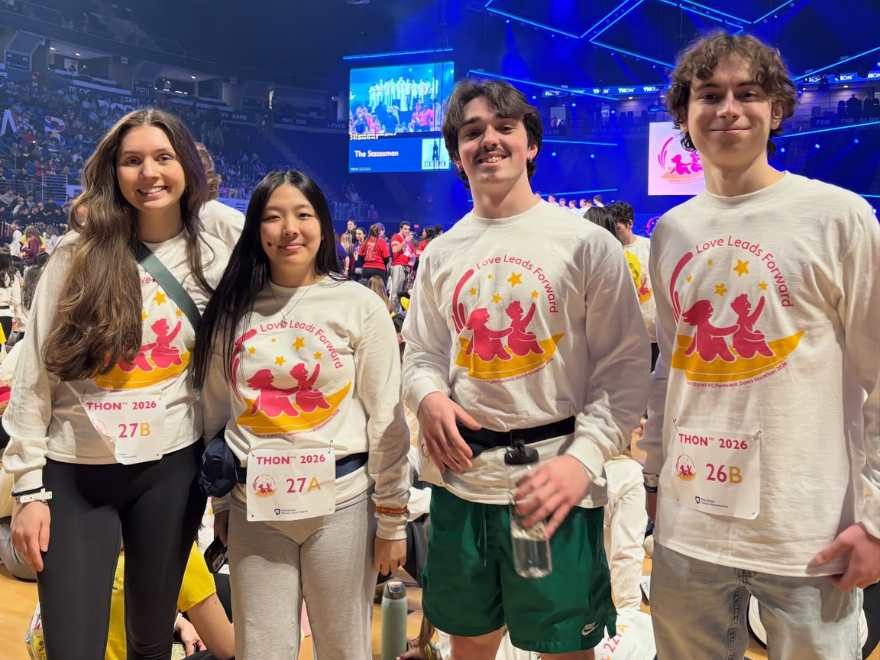 4 dancers representing Penn State Lehigh Valley smile on the THON dance floor