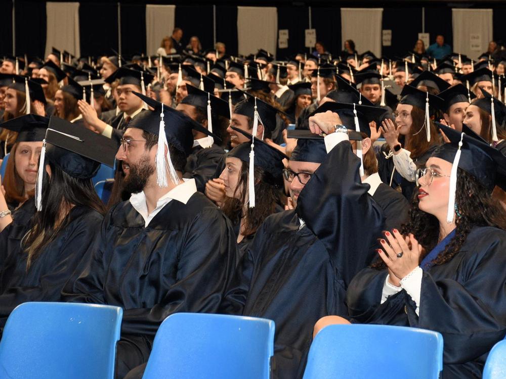 Students in the College of Engineering sit during their commencement ceremony in spring 2023.