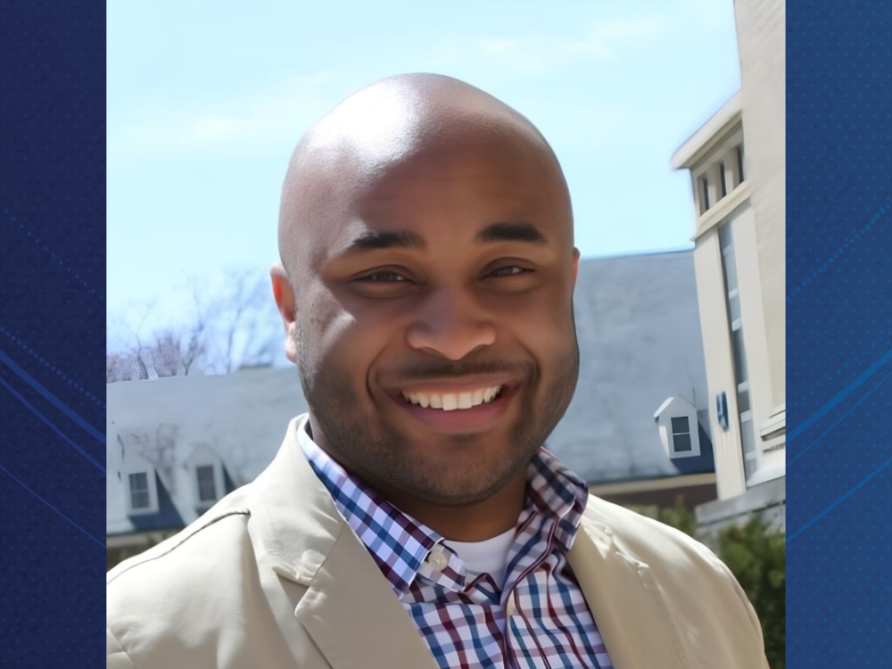 Donovin Lindsay standing outdoors, smiling 