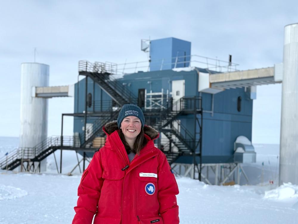 Kayla DeHolton in front of IceCube Observatory