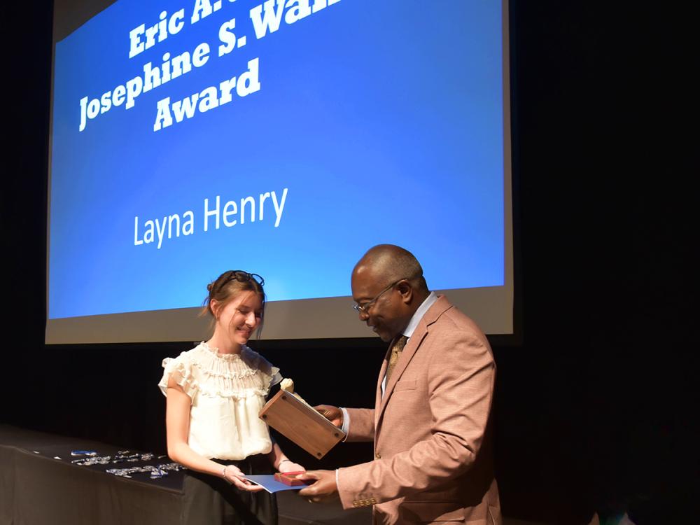 Layna Henry receives the Walker Award from Ron Darbeau, Penn State Altoona Chancellor.