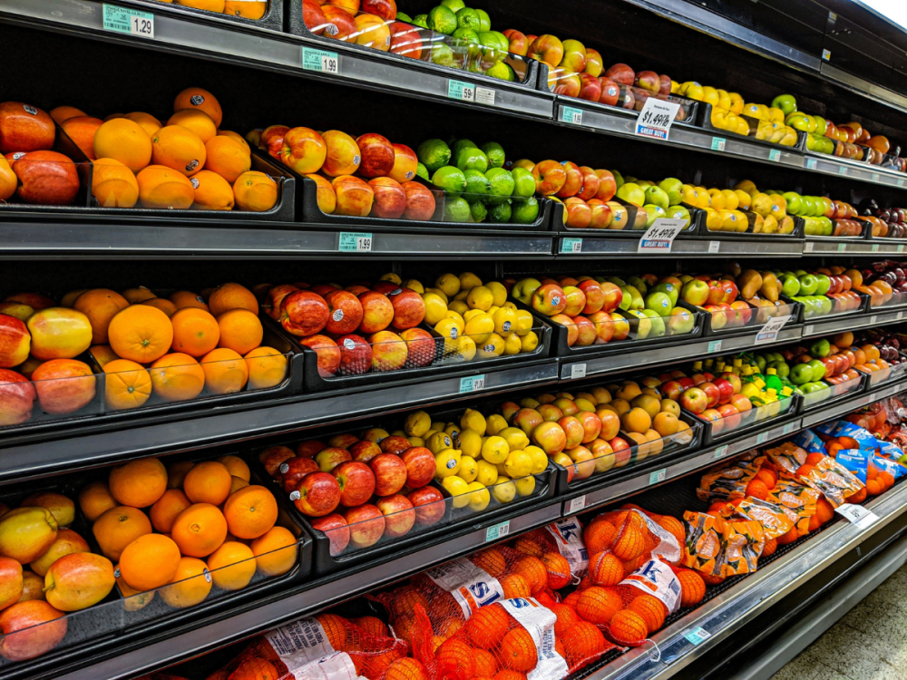 Rows of fresh produce at a grocery store