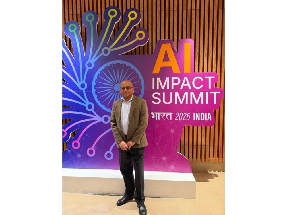person at AI summit in India
