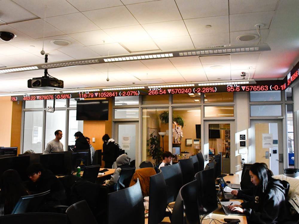 Students working in the Rogers Family Trading Room