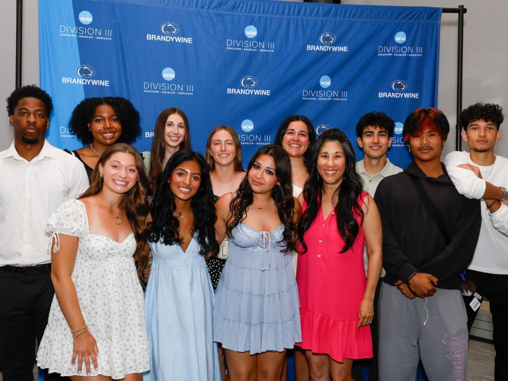 the tennis team in a group photo.