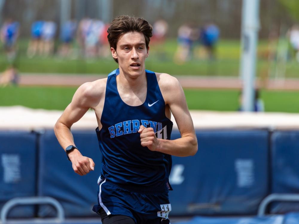 A Penn State Behrend runner competes in the State University of New York Athletic Conference outdoor championships.