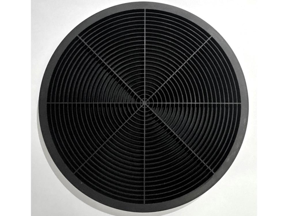 A picture of a 3D printed acoustic metasurface that can be applied to speakers to focus the sound into a tight focal point