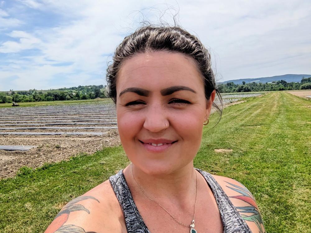 Alex Neill in a field
