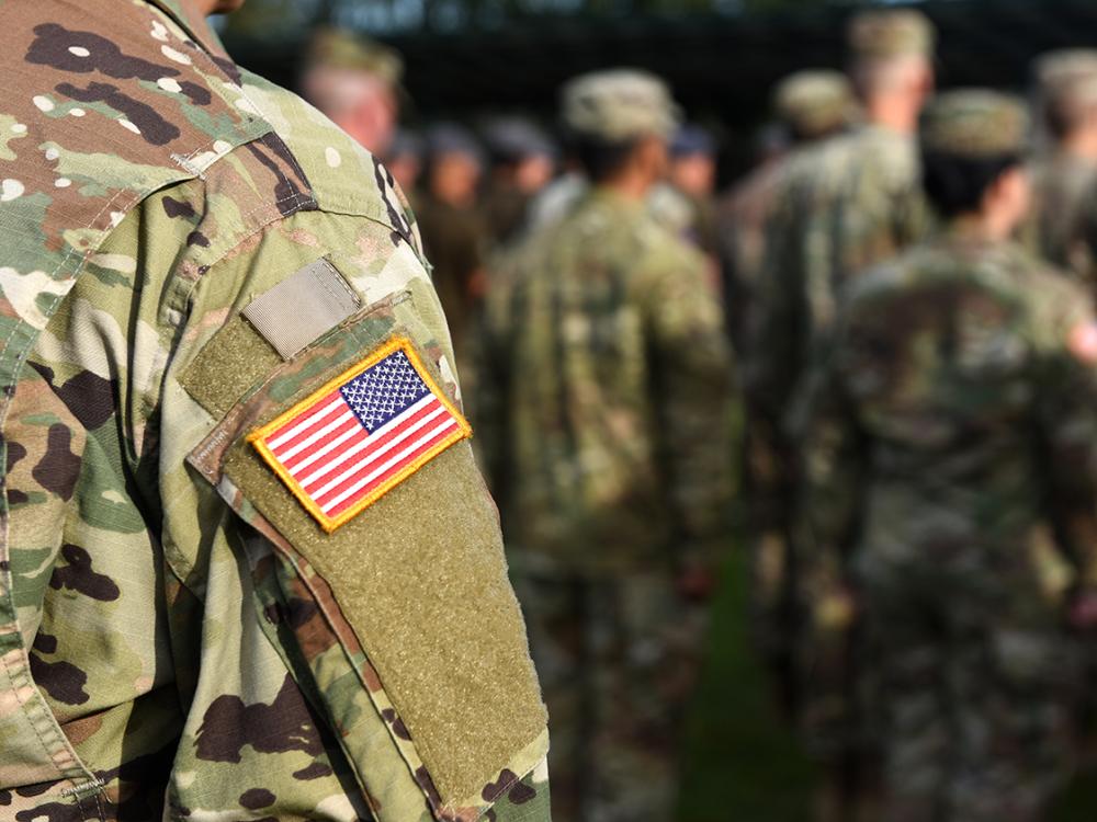 Photo of military personnel from the back