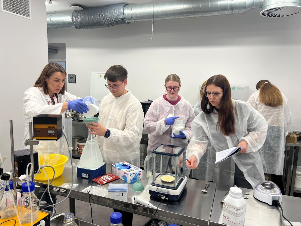 Students participate in a laboratory project during a workshop in Lithuania.