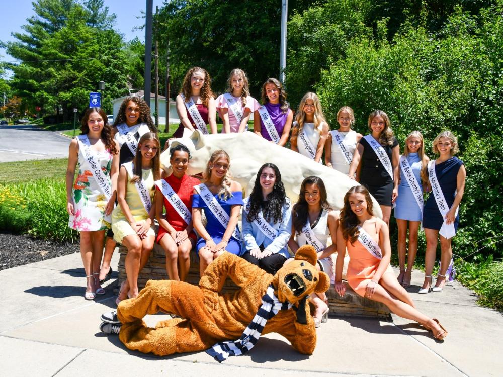 Delegates from across PA stand in front of the Nittany Lion statue.
