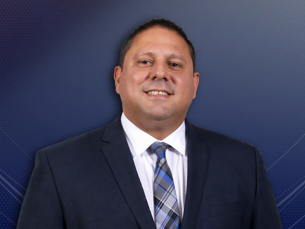 headshot of new athletics director Enrico Mastroianni
