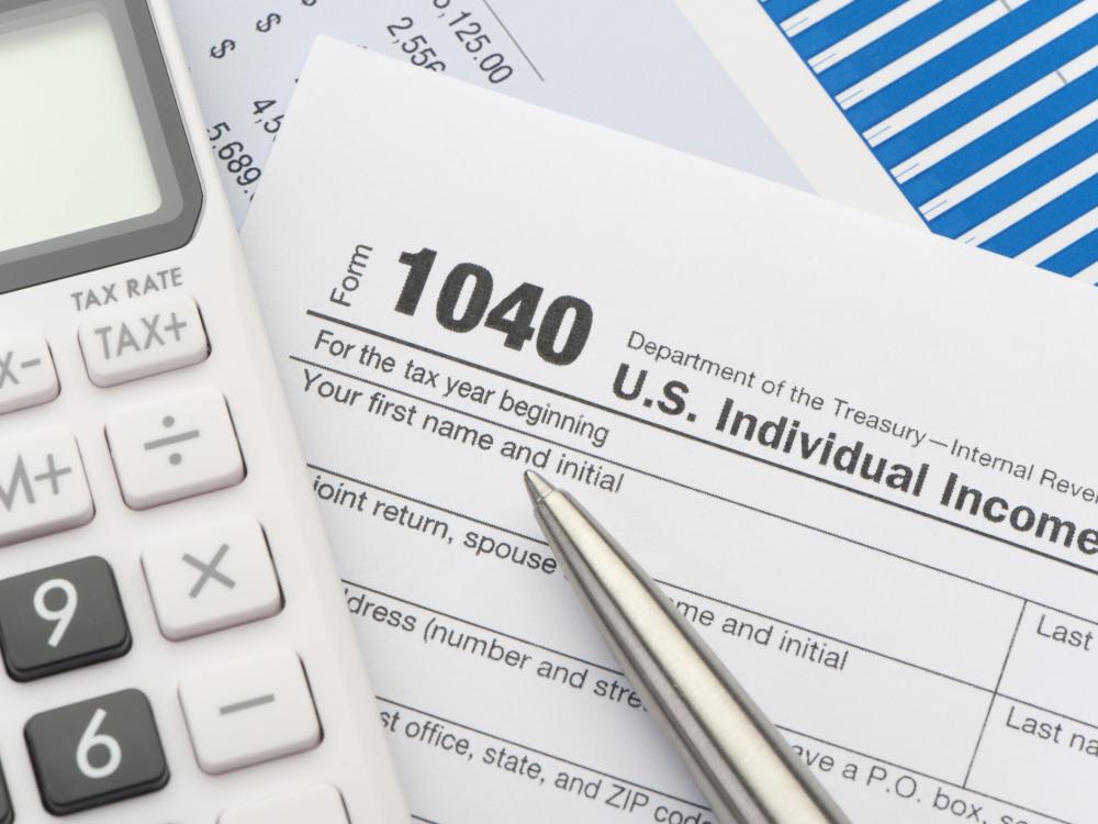 Calculator and 1040 tax form