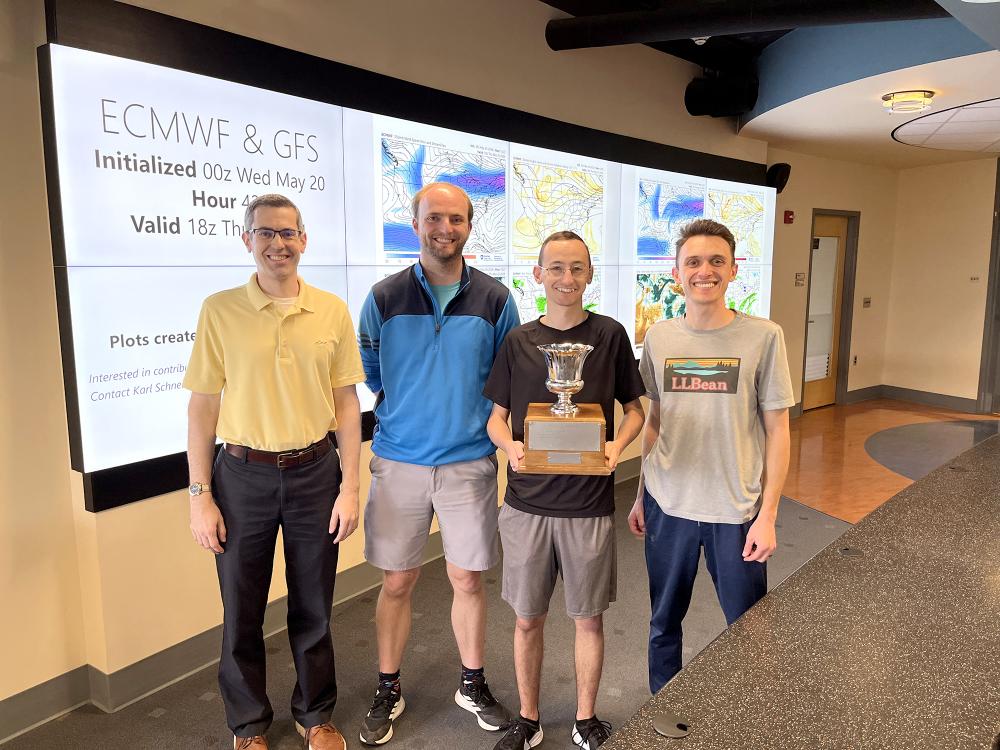 Winning WxChallenge team stands in Joel Myers Weather Center