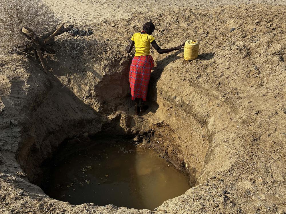 Person stands in a well