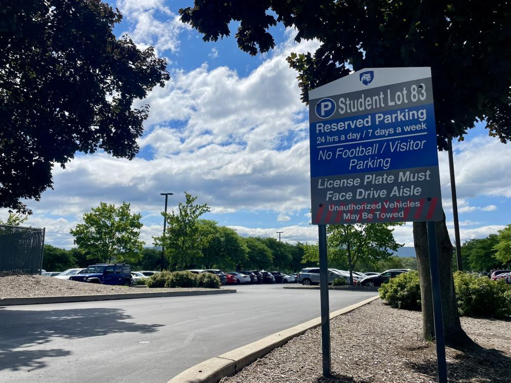 Student Parking Lot 83 sign on a sunny day