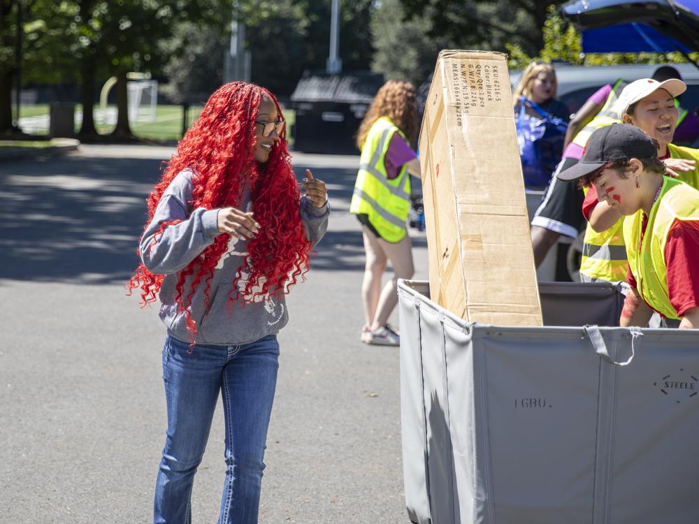 Students transporting their belongings to the residence halls
