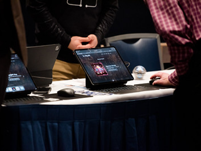 Testing AI media and game tools at the 2026 TLT Symposium.