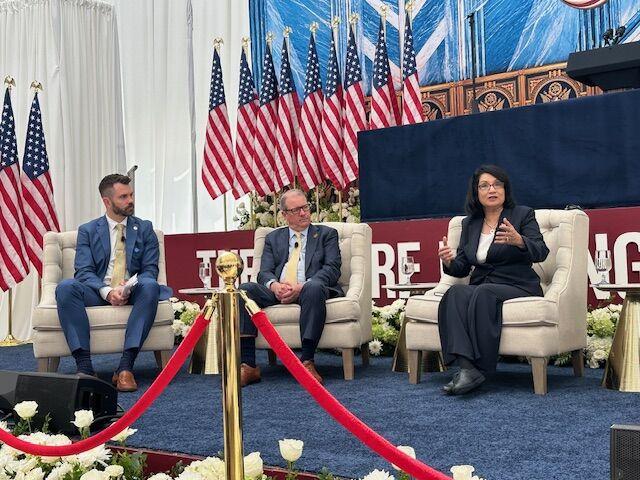Penn State President Neeli Bendapudi speaks on a panel alongside two university leaders