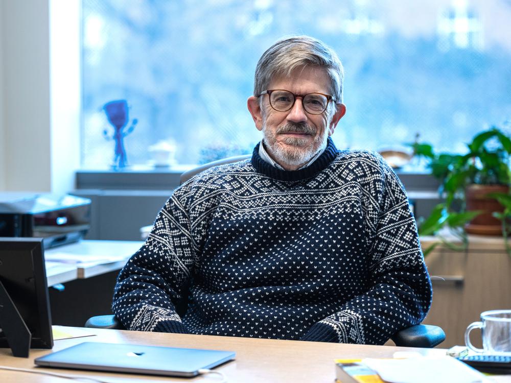 A photo of Scott Milner in his office.