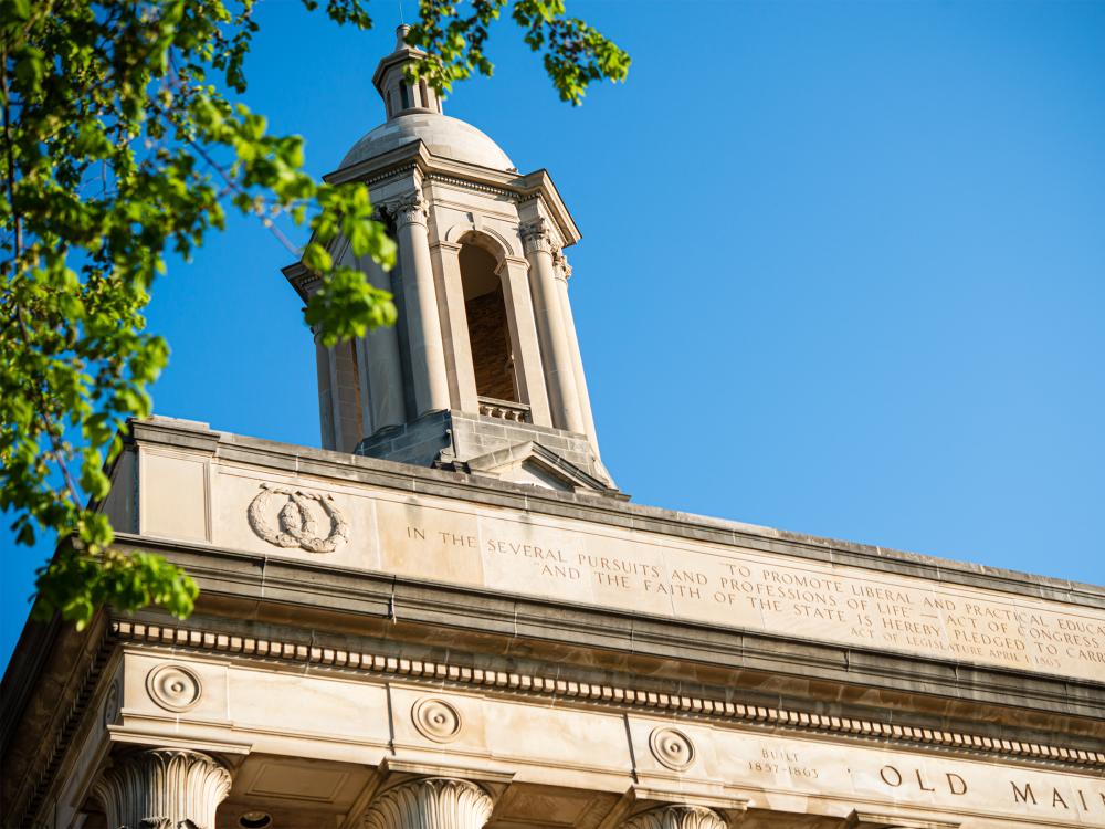 An upward angled shot of the Old Main building.