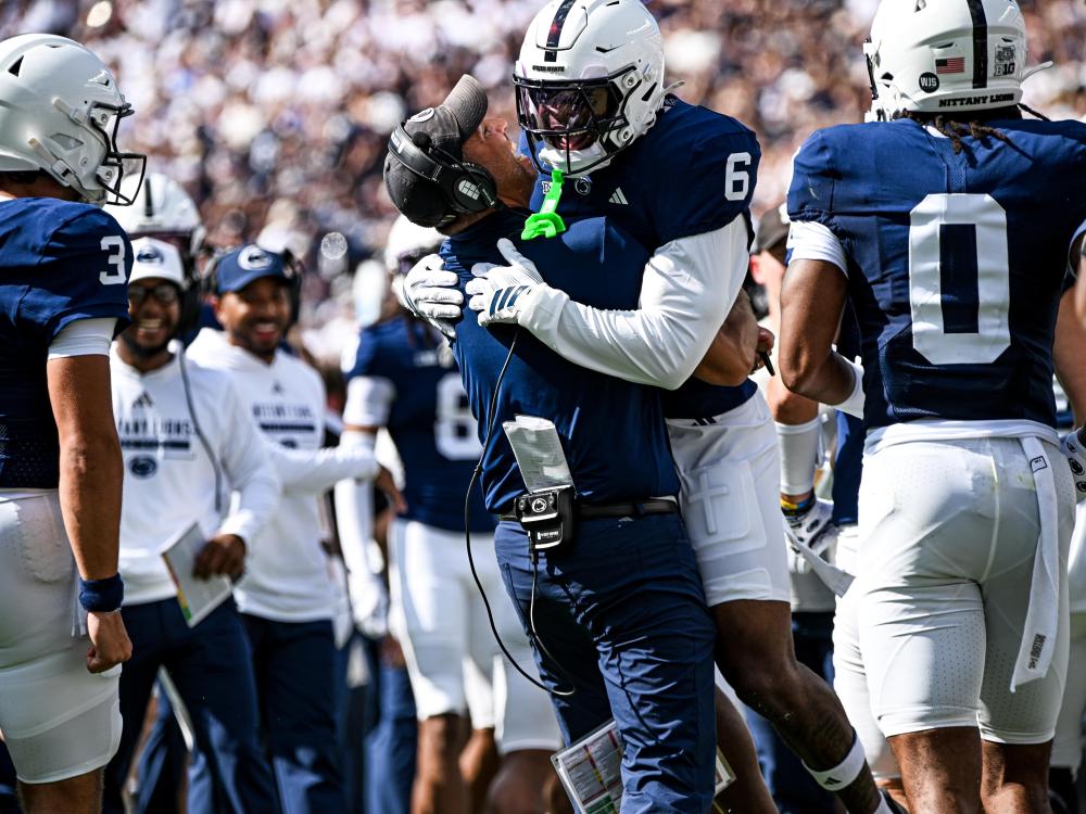 Player hugs coach